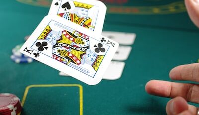 An image showcasing Hong Kong's online gambling platforms, featuring a dynamic collage of famous sports teams and events logos, intertwined with the platforms' branding, symbolizing the fruitful partnerships and exclusive collaborations that benefit players